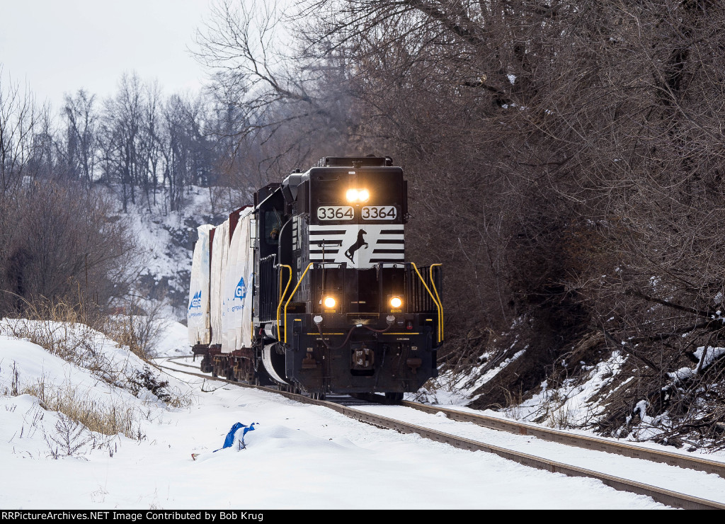 NS 3364 leads train symbol H75 eastbound approaching the Nazareth-Tatamy Road grade crossing